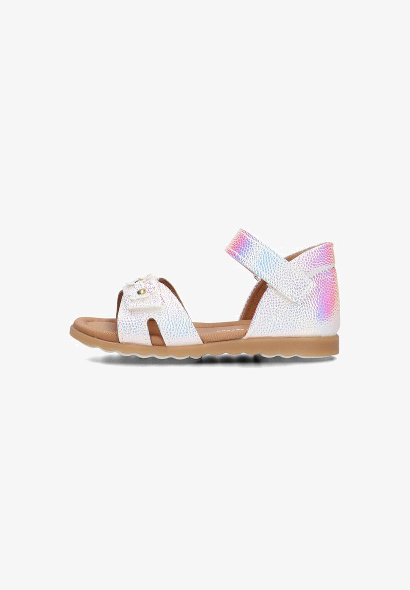 White sandals with a textured holographic finish, open toes, adjustable strap, floral accent, and a flexible, ridged sole.