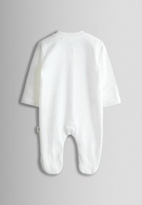 Body alb pentru bebeluși, cu mâneci lungi, guler rotund și închidere cu capse la bază. Material moale din bumbac cu textură fină.