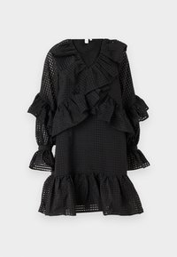 Svart kjole med et teksturert rutemønster, volangermetoder og volangkant. Den har en dyp V-hals og lagdelte volanger.