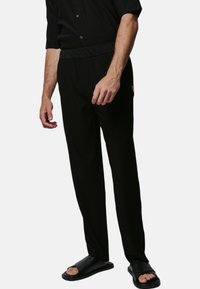 Justin Cassin ABADE  - Broek - black
