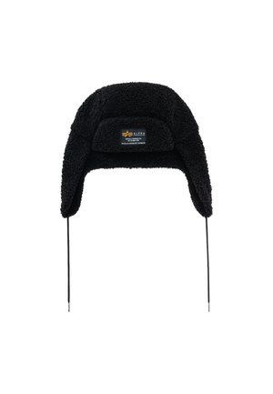 Black sherpa trapper hat with ear flaps and front patch label reading Alpha Industries.