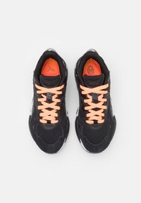 Puma Sneakers - black