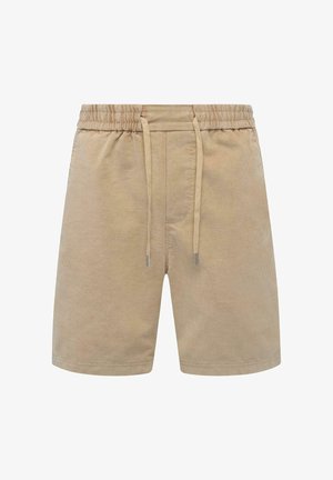 Beige kordfløjlshorts med elastisk talje, snor og to sidelommer. Teksturen er ribbet, hvilket giver en afslappet og komfortabel pasform.