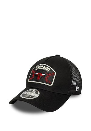 Black mesh baseball cap with Chicago Bulls logo patch and red player silhouettes, curved brim, and New Era brand sticker on front.