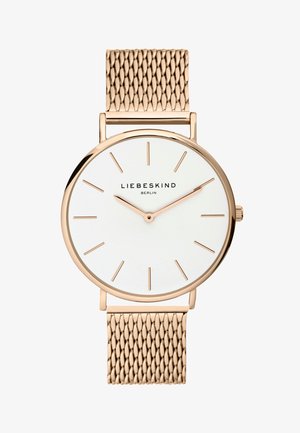 Orologio con cinturino a rete in oro rosa, quadrante rotondo bianco, marcatori delle ore minimalisti e lancette. Il retro presenta una finitura lucida. Nome del marchio mostrato.