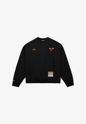 Felpa nera con scollo rotondo, logo rosso dei Chicago Bulls sul petto, tasche laterali e un'etichetta in tessuto all'orlo.