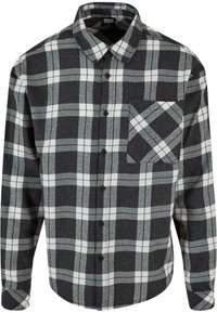 ternet skjorte i sort, grå og hvid. Fremstillet af flannel, med knaplukning foran, spids krave og en brystlomme med et matchende mønster.