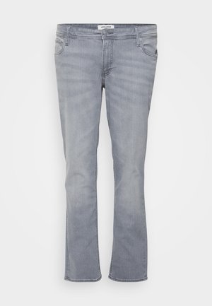 Φωτεινό γκρι τζιν καμπάνα από denim, με κλασικό σχεδιασμό πέντε τσεπών, μέση με θηλιά για ζώνη και ραφές διακοσμητικές.