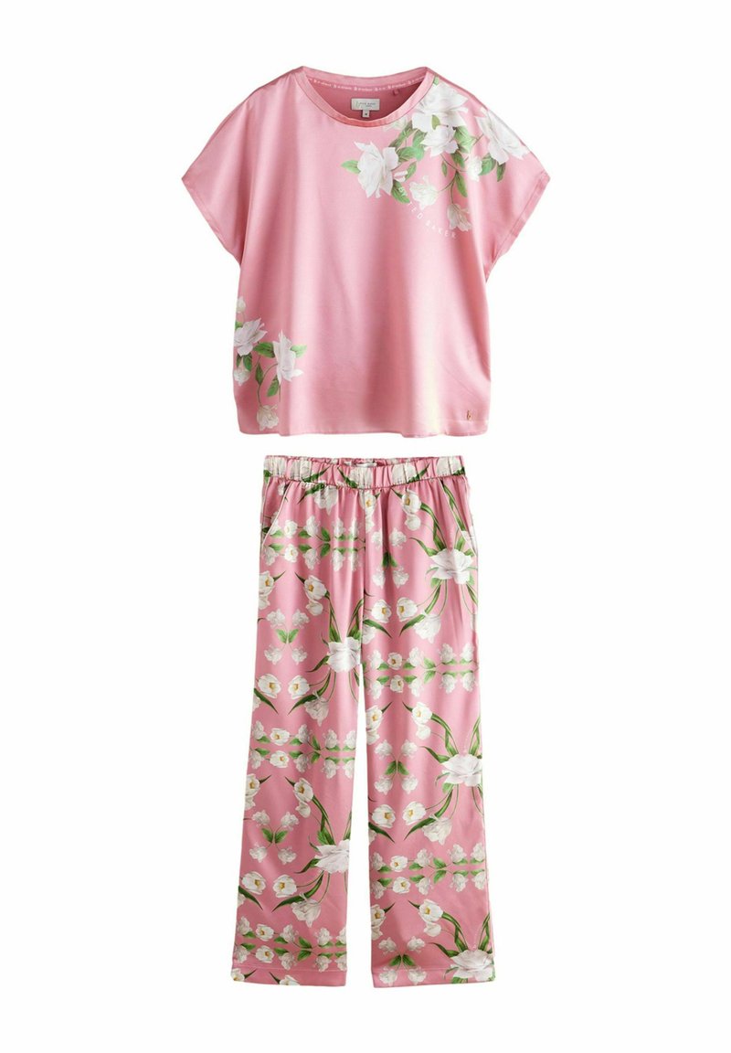 Pink floral lounge set featuring a short-sleeve top with a smooth texture and loose fit, paired with matching elastic waist pants, both adorned with white blossoms.