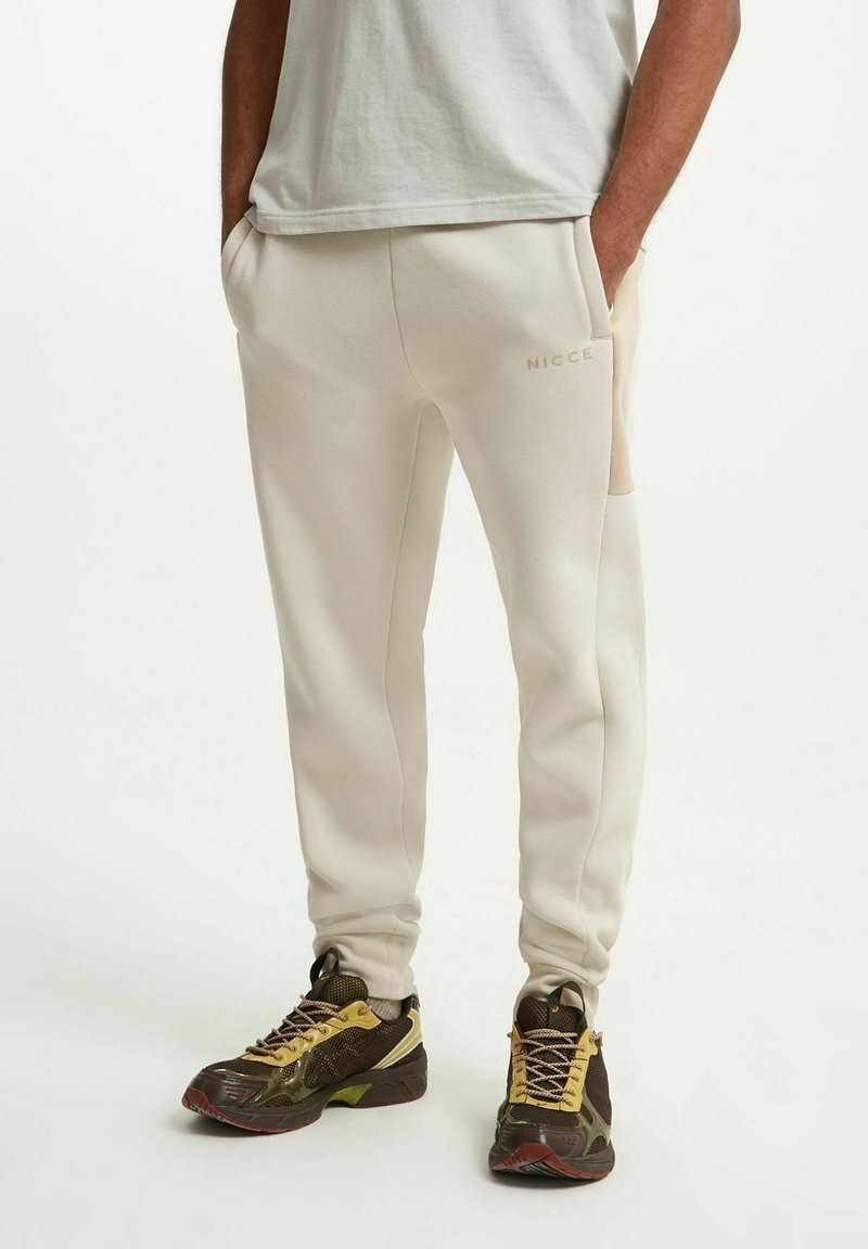 Nicce ADRA UNISEX Tracksuit bottoms grey Zalando.de