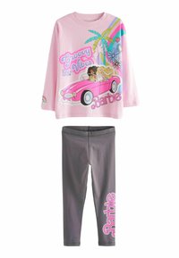 Rosa långärmad skjorta med "Groovy Vibes" och Barbie-grafik, kombinerad med grå leggings med rosa "Barbie"-text på sidan.