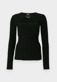 Top a maniche lunghe nero a costine con scollatura alta, caratterizzato da un dettaglio intagliato e un accento circolare dorato al petto. Texture liscia.