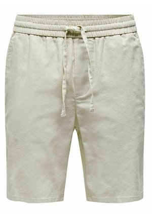 Shorts beige clair en tissu doux, avec une taille élastique dotée d'un cordon de serrage, des poches latérales et une coupe décontractée.