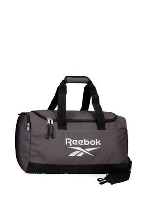 Bolsa de deporte Reebok gris y negra con asas dobles, una correa para el hombro y varios compartimentos con cremallera.