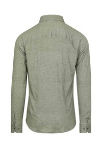 Groene longsleeve shirt gemaakt van textuurstof, met een klassieke kraag, knoopmanchetten en rugplooidetails.