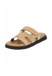 Sandal in suede beige a slip-on con un design a intaglio. Presenta due cinture larghe e una suola in gomma nera con dettagli testurizzati per una migliore aderenza.