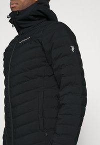 Peak Performance FROST SKI JACKET - Daunenjacke - black