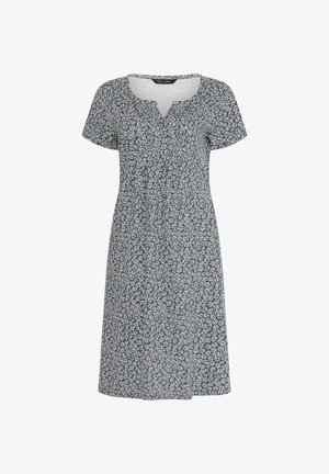 Robe courte à manches courtes bleu foncé avec motif floral de marguerites blanches, encolure ronde avec une petite découpe en V, ourlet au niveau du genou.