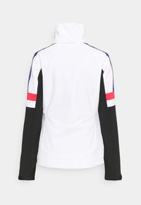 White jacket with black sleeves, high collar, and color accents in red and blue. Features a smooth texture and contrasting panel design.
