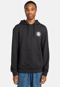 Black hoodie made of cotton blend, featuring a front pocket and drawstring hood. Includes a circular logo on the chest in white.