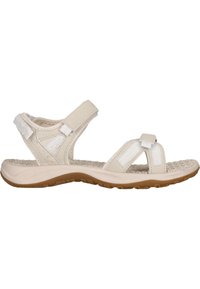 Vaaleanbeige sandaalit, joissa on useita hihnadesigneja, säädettävät kiinnitykset ja teksturoitu pohja. Kumipohja, jossa on kuvioitu pito vakauden takaamiseksi.