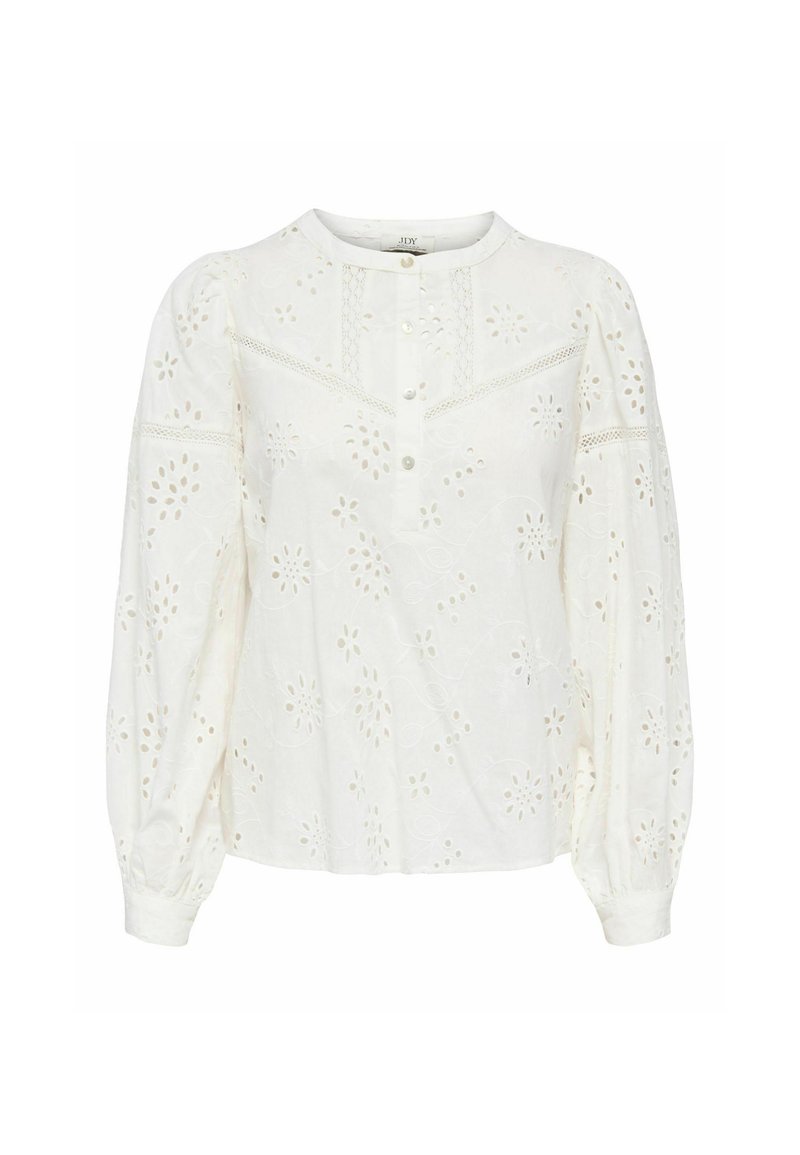 Blouse blanche ornée d'une broderie florale complexe, avec un col rond, une fermeture à boutons, et des manches longues bouffantes avec des poignets ajustés.