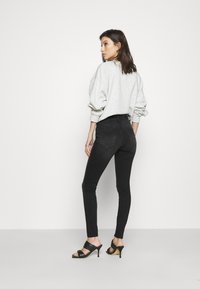 ONLY ONLBLUSH MID - Calças de ganga de corte skinny - black denim