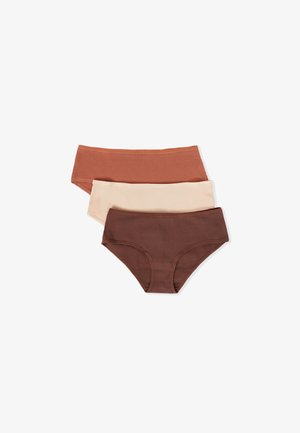 Three pairs of ribbed panties in rust, beige, and dark brown colors. Each features a high-rise design and soft, stretchy fabric.
