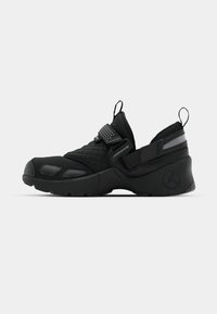 TRUNNER LX UNISEX - Baskets basses - black
