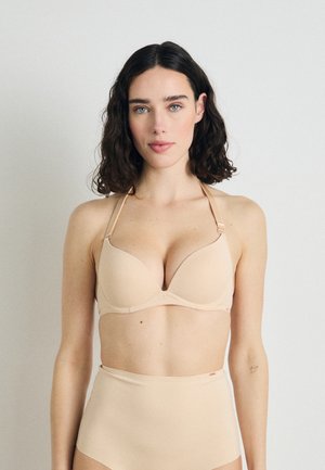 MICHELLE SOLUTION - Merevítős melltartó - beige