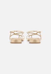 Tamaris T-bar sandals - gold