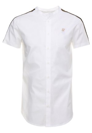 Hvid kortærmet skjorte med knapper, med sorte og gyldne striber på skuldrene og lille broderet logo på venstre bryst.