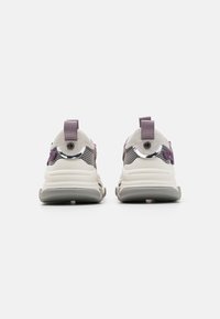 Sneakers with a purple suede upper, mesh panels, and gray sole. Features a padded collar, heel loop, and metallic accents.