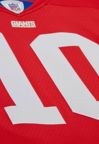 Red NFL jersey with white number 10 and "GIANTS" text logo below the collar.