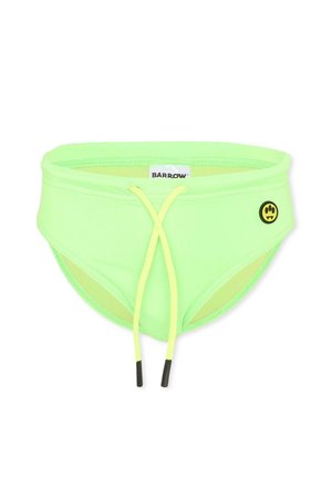 Jasnozielone męskie kąpielówki z żółtym sznurkiem z przodu i małą czarno-żółtą naszywką z logo po prawej stronie.