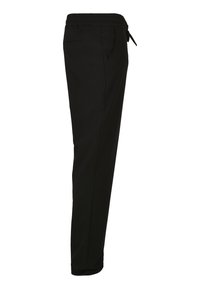Zwarte op maat gemaakte broek met een relaxte pasvorm, voorzien van een elastische tailleband, aantrekkoord en zijzakken. Glad materiaal zonder patronen.