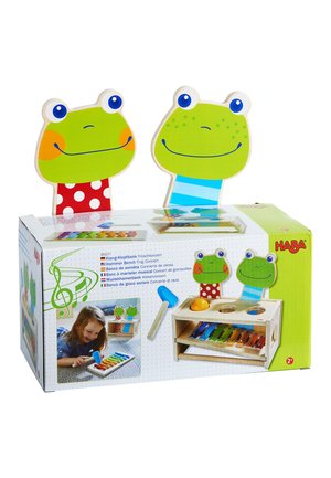 Children's musical toy with two frog faces, a small hammer, and colorful xylophone keys, designed for ages 2 and up.