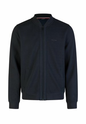 Marineblaue Zip-Jacke aus weichem Baumwollmix. Verfügt über einen runden Kragen, zwei Fronttaschen, gerippte Bündchen und ein dezentes Logo auf der Brust.