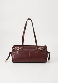 Burgundy leather handbag with two shoulder straps, gold-tone hardware, a smooth finish, and decorative tassels on the sides.