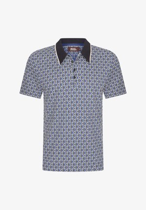 Lyhythihainen poolopaita tummansinisellä pohjalla, jossa on geometrija kuvio kerma- ja sinisävyissä. Pehmeä kangas, klassinen kaulus, jossa on kontrastivärinen musta reunus.