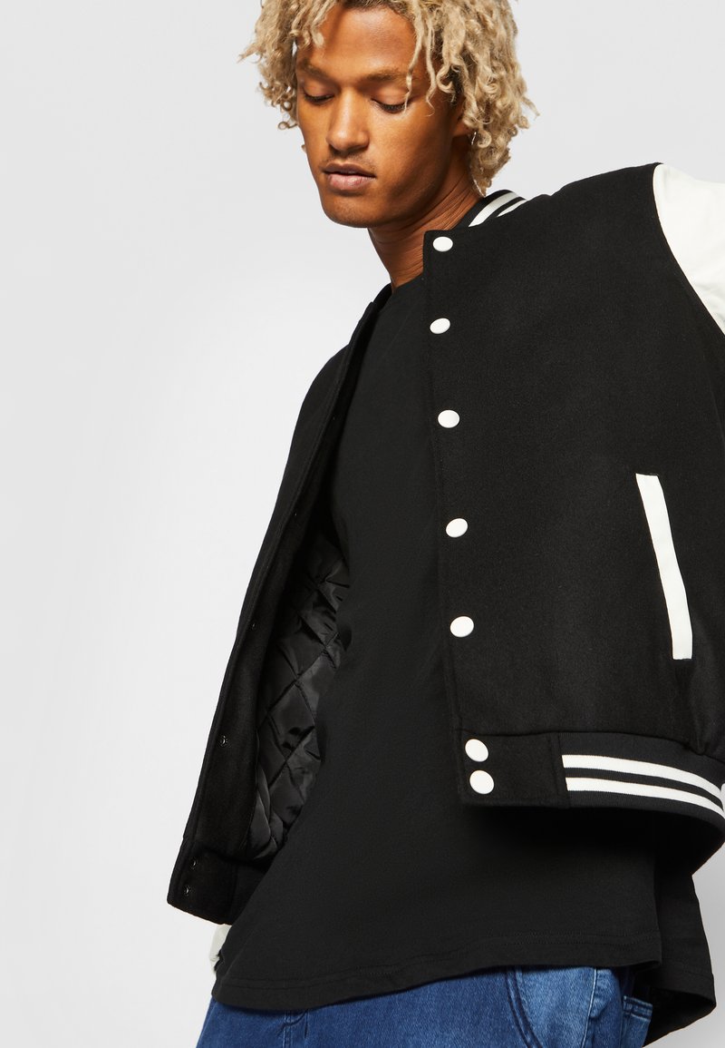 Kaufe College-Stil Varsity Jacke Männer Frühling Brief Stickerei Bomber Jacke Casual Straße Lose Patchwork Zipper Mantel Frauen Paar zum Preis ab 17