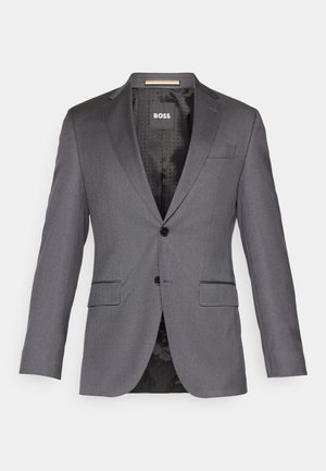 Grauer maßgeschneiderter Blazer mit Reverskragen, zwei Vorderaschen, Ein-Knopf-Verschluss und schwarzer Fütterung mit einem dezenten Muster.
