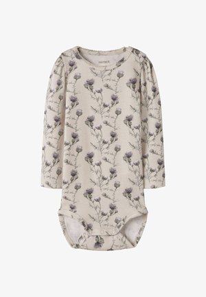 Roomkleurig babyrompertje met lange mouwen, paarse distelbloemenprint, ronde halslijn en drukknoopsluiting aan de onderkant.