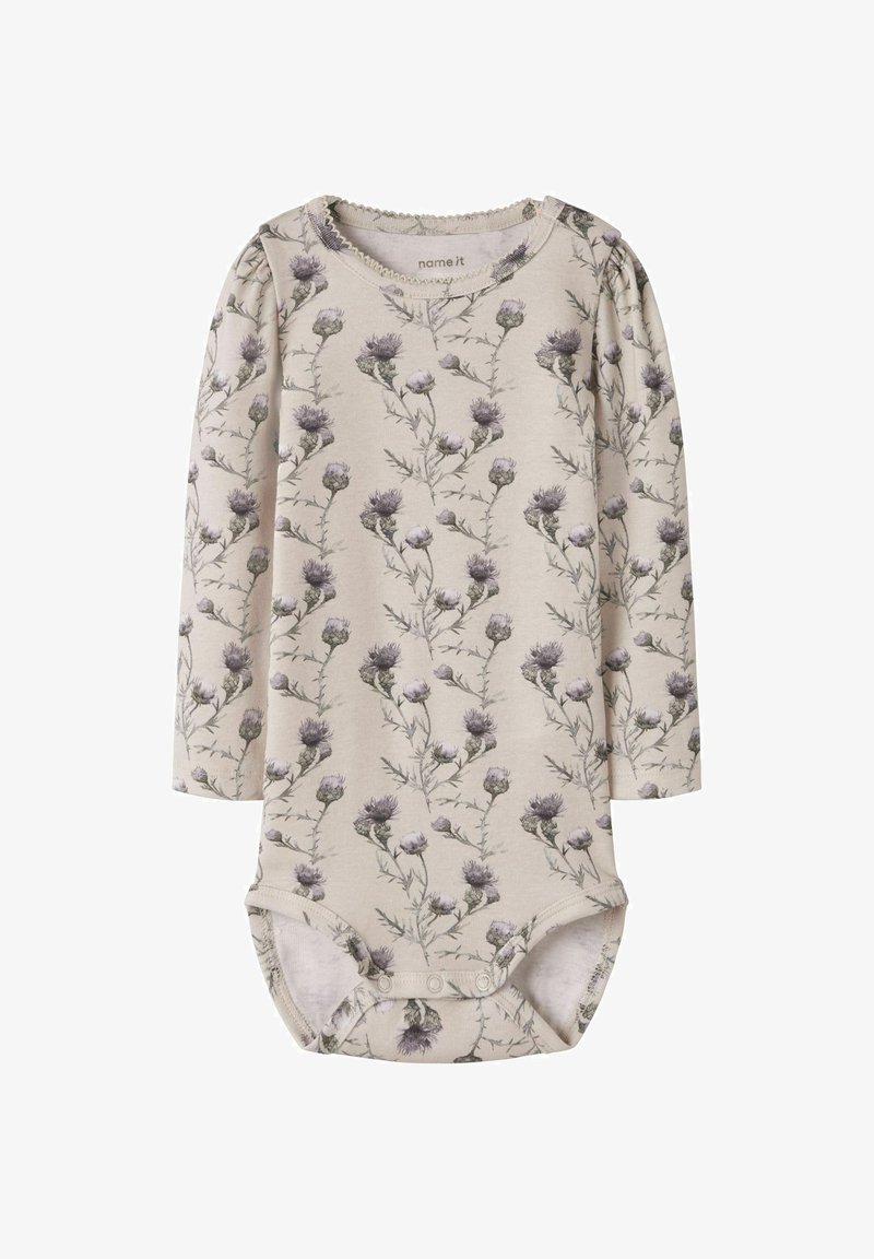 Body bébé à manches longues de couleur crème avec imprimé floral de chardon violet, col rond et boutons-pression au bas.