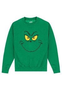 Sudadera verde con una gran cara impresa de un personaje con ojos amarillos y una sonrisa traviesa, hecha de un tejido suave.