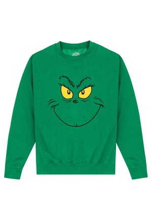 Sudadera verde con una gran cara impresa de un personaje con ojos amarillos y una sonrisa traviesa, hecha de un tejido suave.