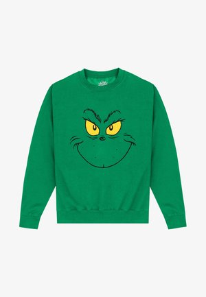 Grøn sweatshirt med et stort, trykt ansigt af en karakter med gule øjne og et lumsk smil, lavet af blødt stof.