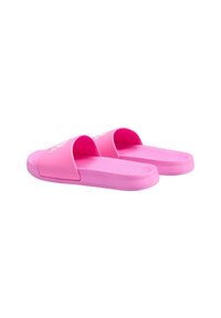 Pink slide sandals made of rubber, featuring a textured footbed, wide open toe straps, and a flat sole for comfort and ease of wear.