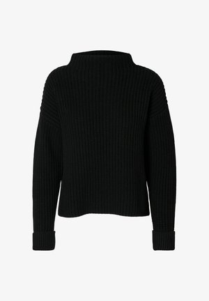 Must mustriga mustri kõrge kaeluse ja sooniku tekstuuriga must kootud kootud. Omab laiu krooge randmete juures ja lõdva lõikega.