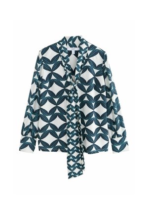 Hvid bluse med lange ærmer med mørkegrønt geometrisk bladermønster og fastgjort slipse sløjfe ved kraven.